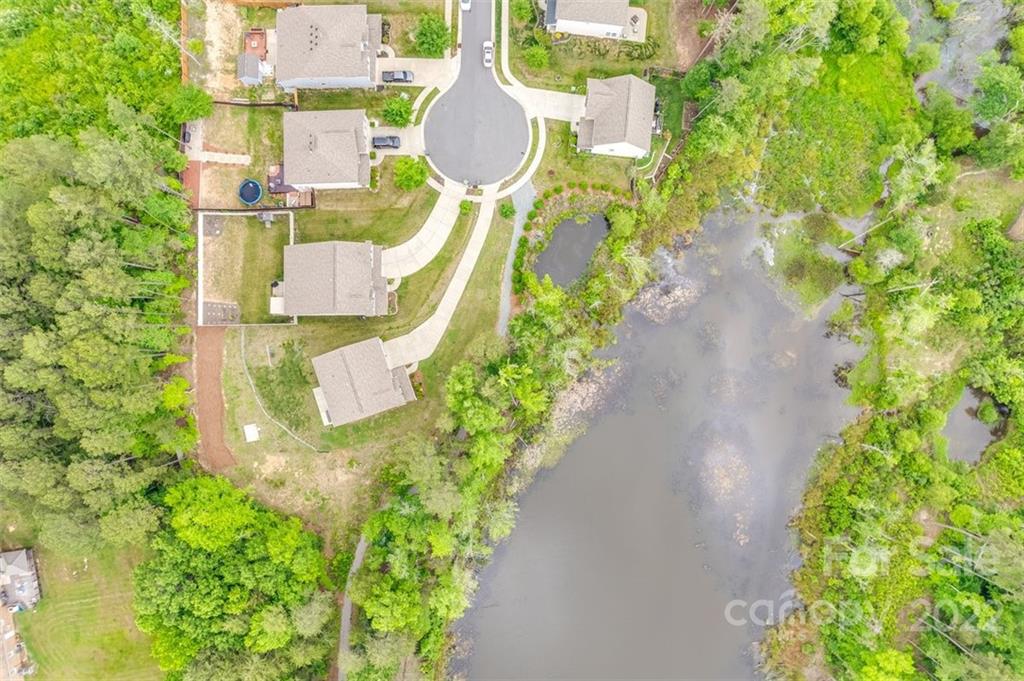 6403 Bluegill Road Charlotte, NC 28216 - Photo 46 of 48 a view of a fountain in a garden