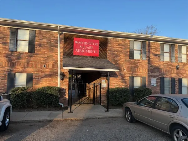 a view of a car park in front of building