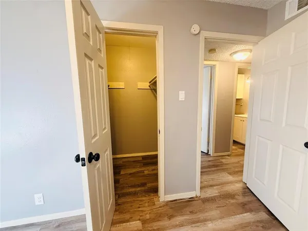 a view of a bathroom with a glass door