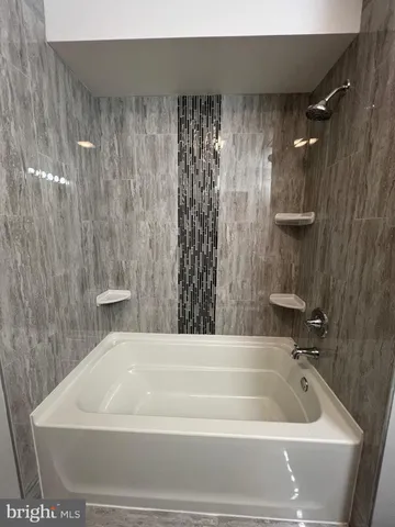 a bathroom with a bathtub