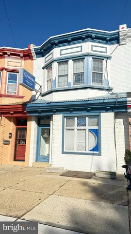 a front view of a house with a garage