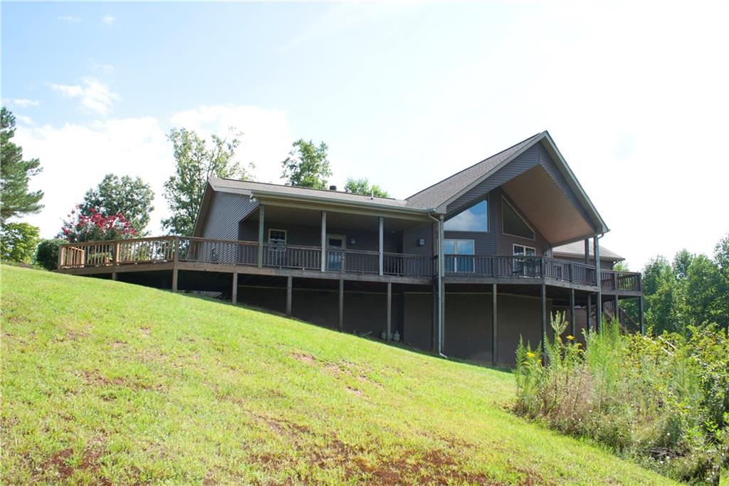 2780 Black Knob Church Road Ranger, GA 30734 - Photo 1 of 1 a view of a house with a yard