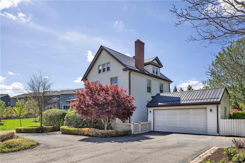 1226 Mayview Road Pittsburgh, PA 15241 - Photo 2 of 42 The detached two-car garage offers more than just parking. It is fully insulated and versatile, it’s perfect for storage, hobbies, or a private workspace.