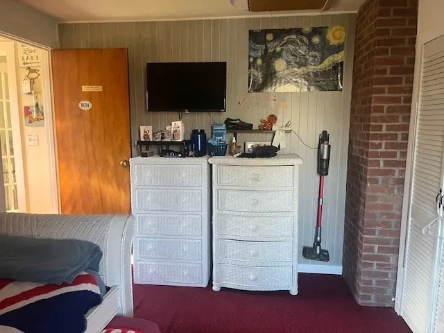 a kitchen with a refrigerator and a sink