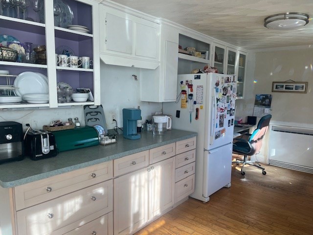 23 Lakewood Road Yarmouth, MA 02664 - Photo 3 of 15 a kitchen with stainless steel appliances a refrigerator and cabinets