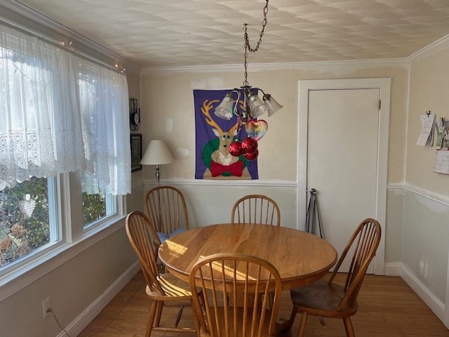 23 Lakewood Road Yarmouth, MA 02664 - Photo 6 of 15 a view of a dining room with furniture window and outside view