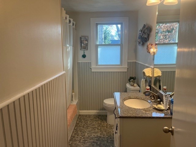 23 Lakewood Road Yarmouth, MA 02664 - Photo 7 of 15 a bathroom with a sink vanity granite and toilet