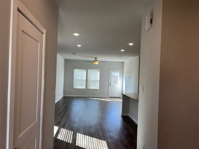 a view of entryway with wooden floor