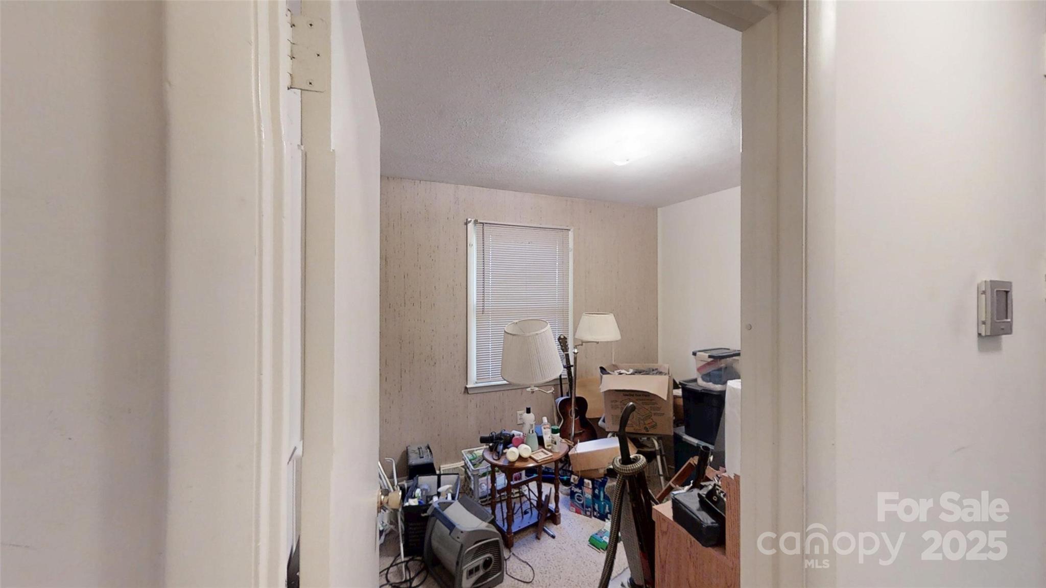 111 Cisco Road Asheville, NC 28805 - Photo 12 of 30 a view of a room with gym equipment