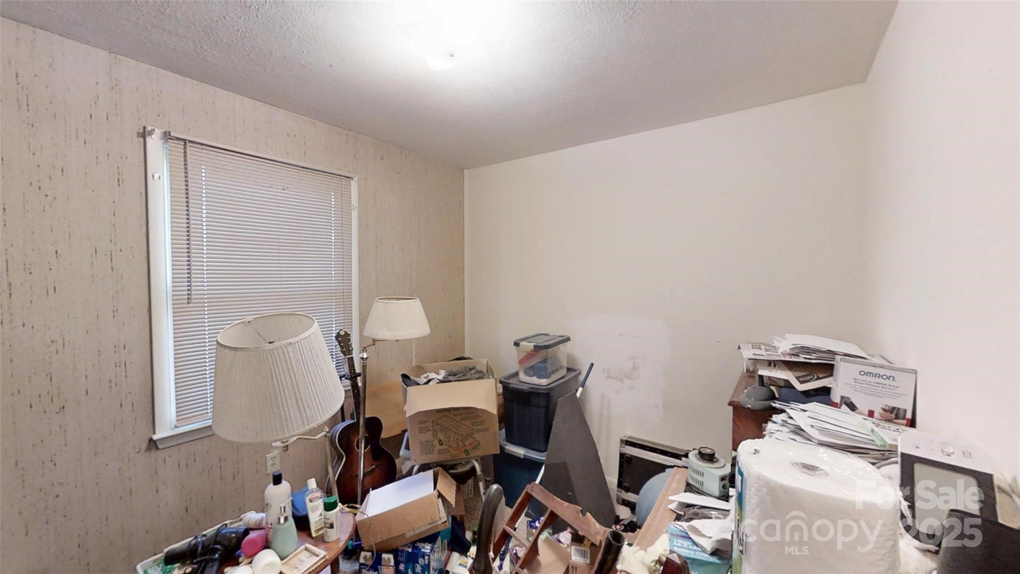 111 Cisco Road Asheville, NC 28805 - Photo 13 of 30 a view of a workspace with furniture and wooden floor