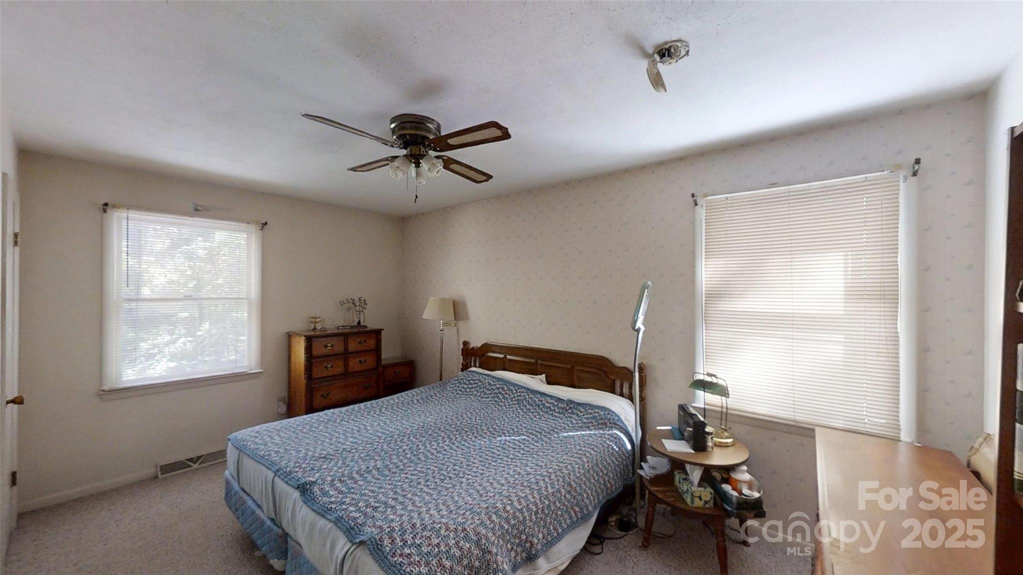 111 Cisco Road Asheville, NC 28805 - Photo 15 of 30 a bedroom with a bed and a window