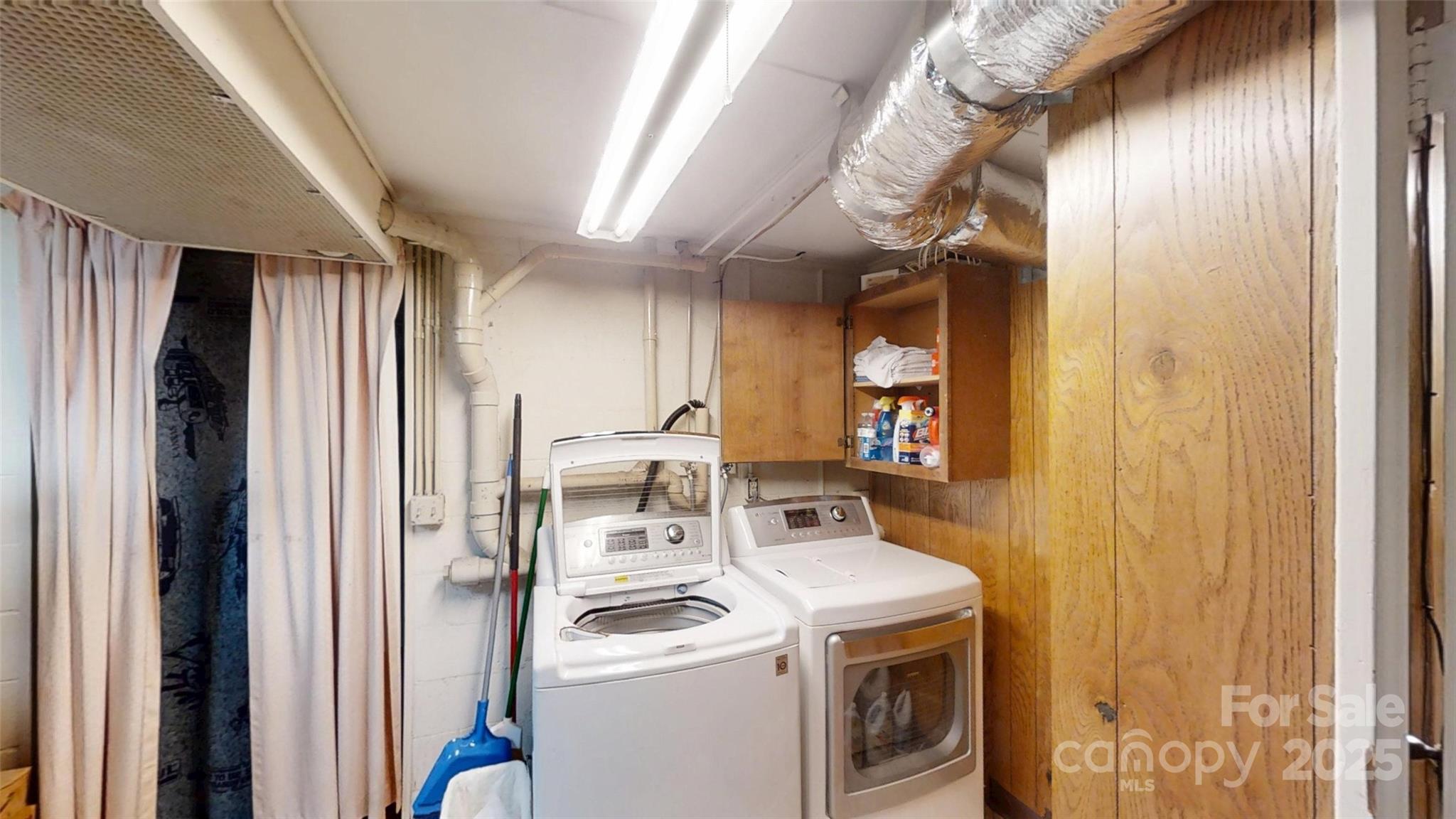 111 Cisco Road Asheville, NC 28805 - Photo 21 of 30 a utility room with dryer and washer