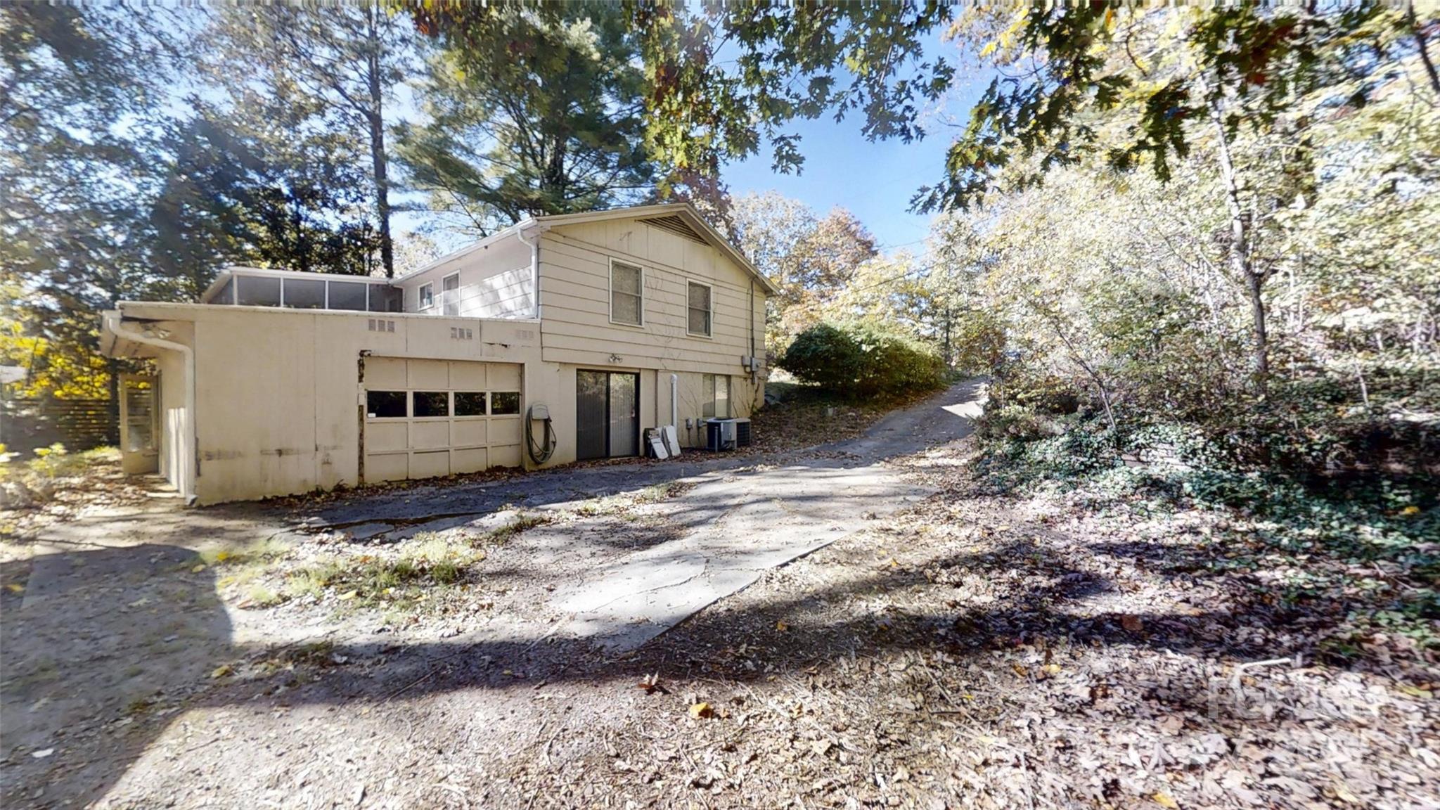 111 Cisco Road Asheville, NC 28805 - Photo 25 of 30 a view of a house with a yard
