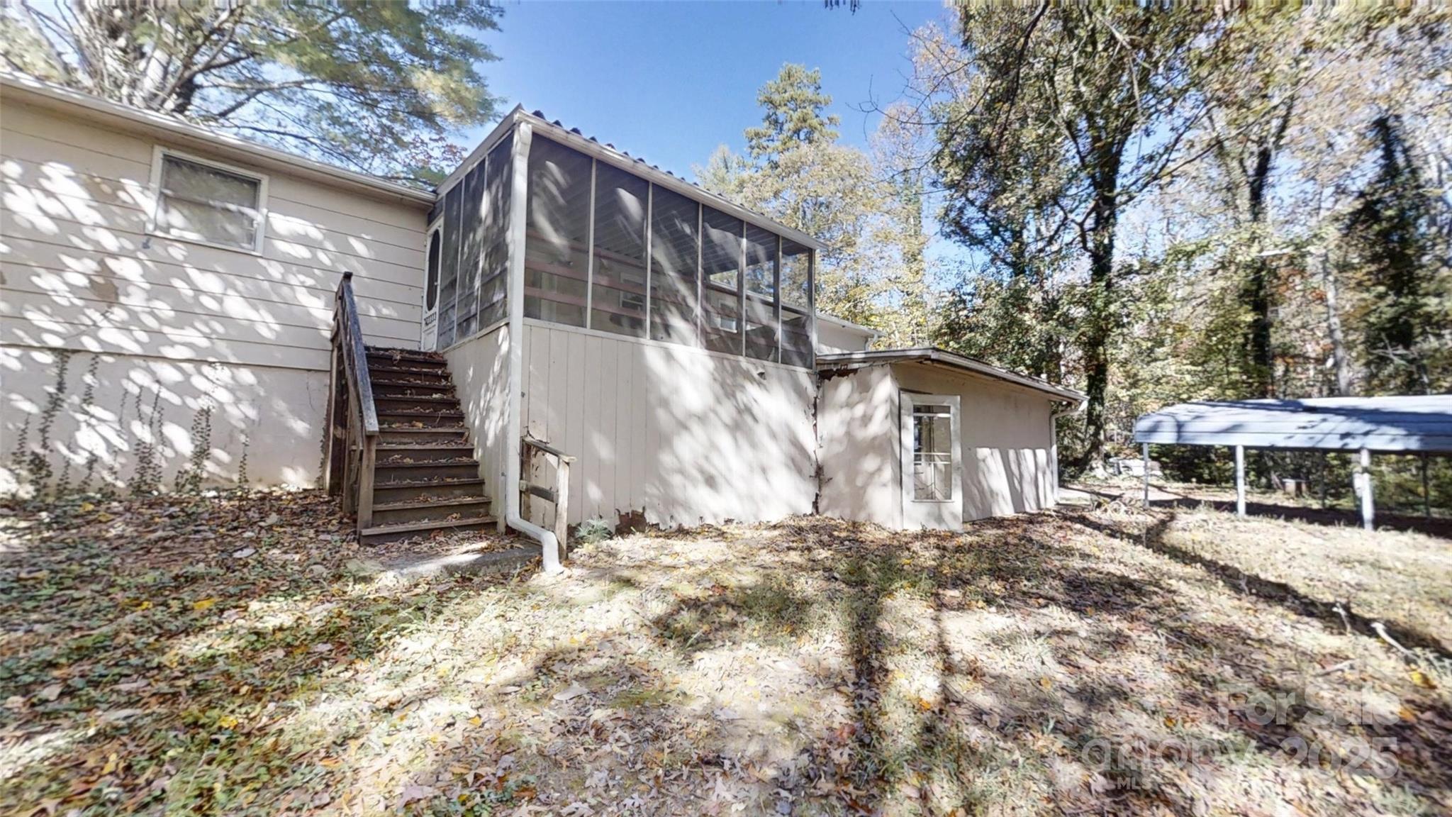 111 Cisco Road Asheville, NC 28805 - Photo 26 of 30 a view of a house with a yard
