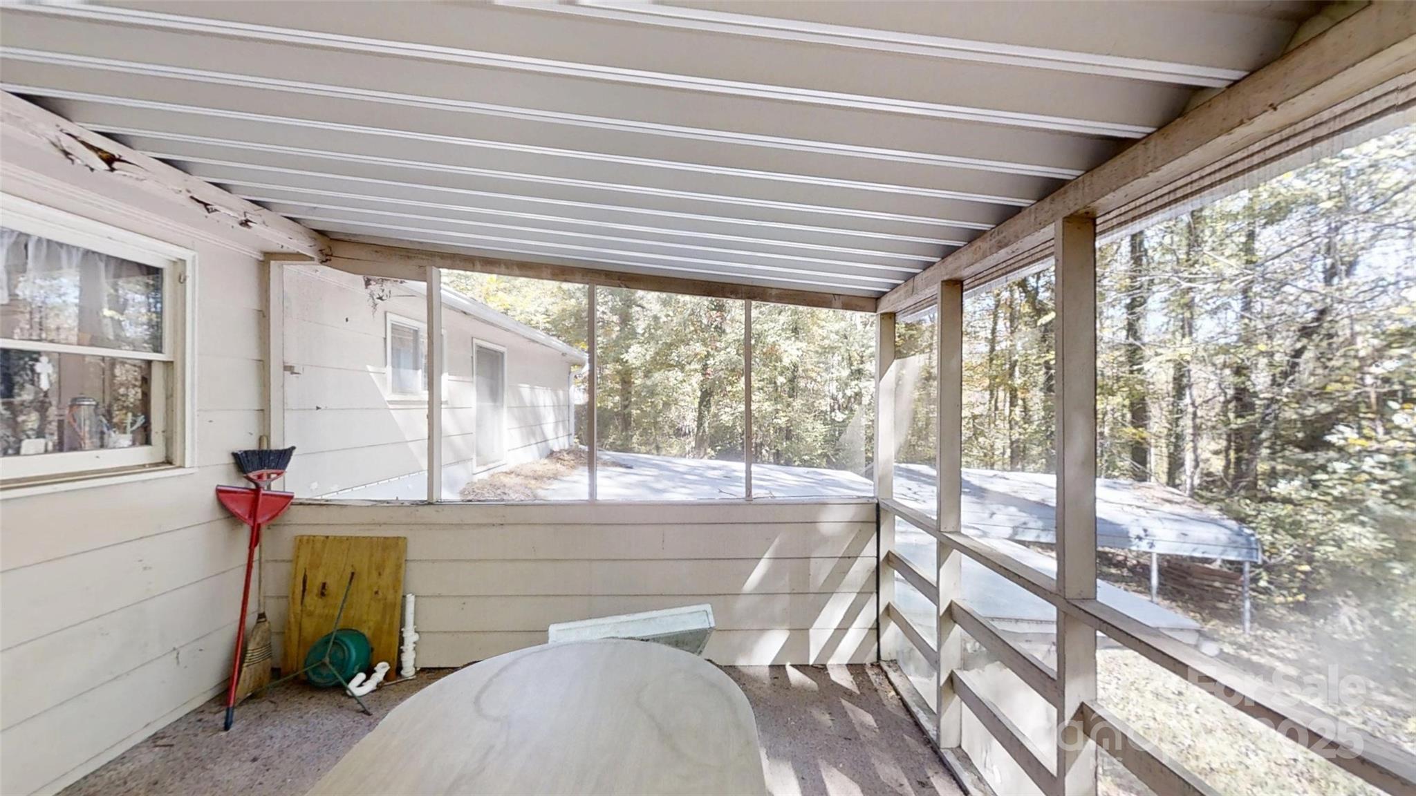 111 Cisco Road Asheville, NC 28805 - Photo 8 of 30 a room with a large window