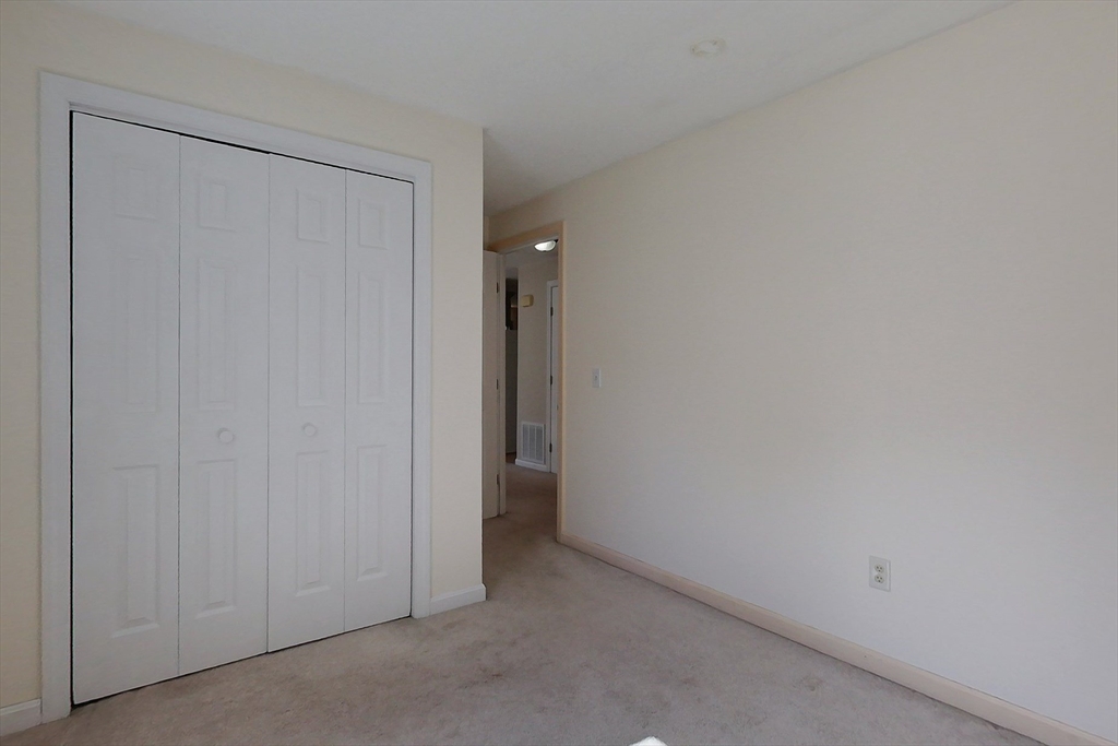 103 Main Street, Unit 10 Pepperell, MA 01463 - Photo 16 of 22 a view of an empty room