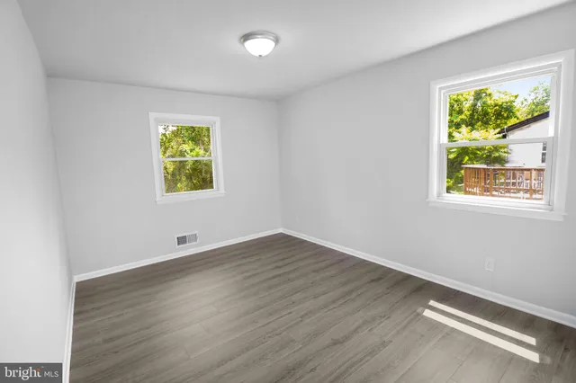 an empty room with window