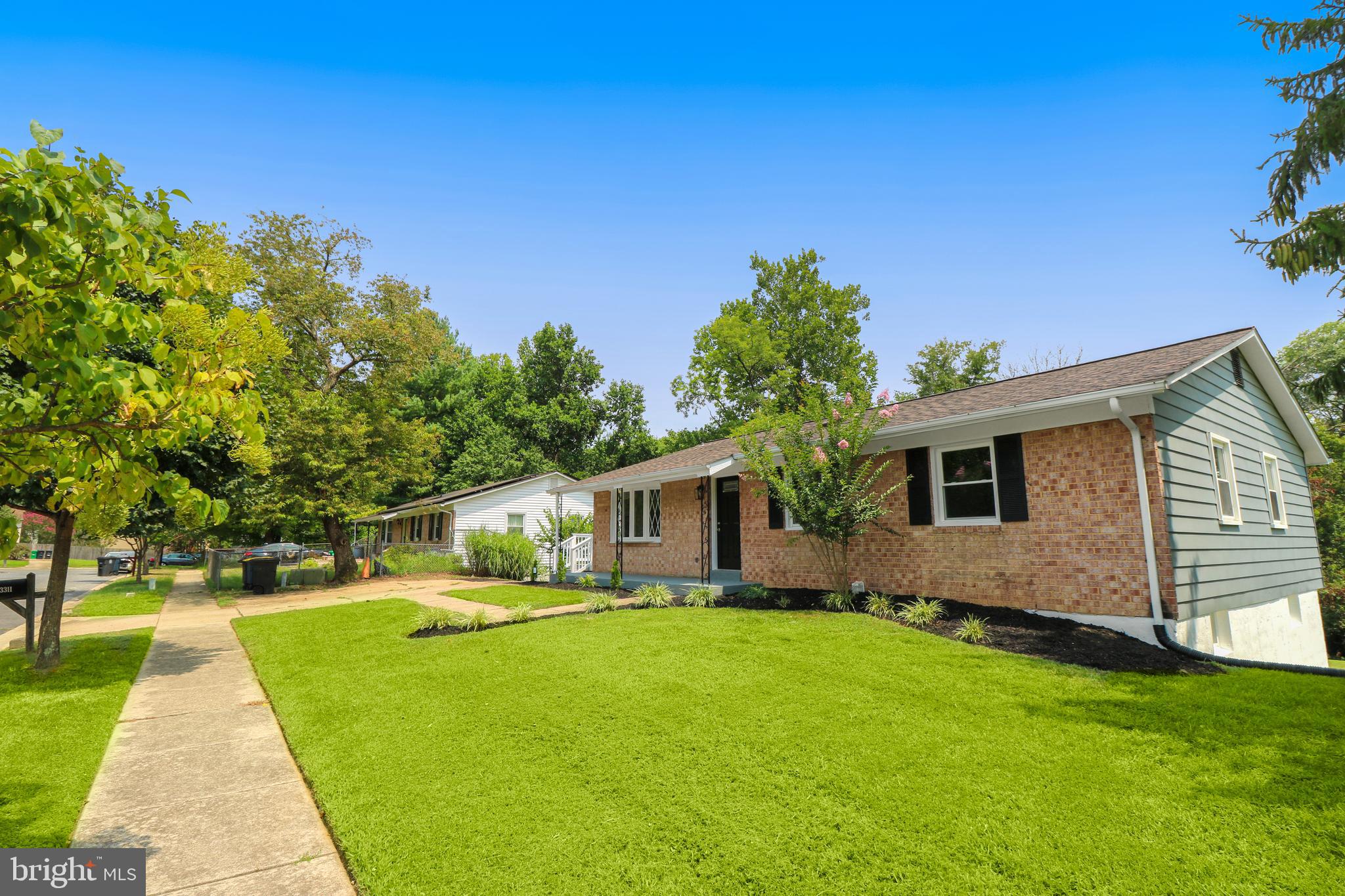 3311 Michele Lane Mitchellville, MD 20721 - Photo 3 of 44 a front view of house with yard and green space
