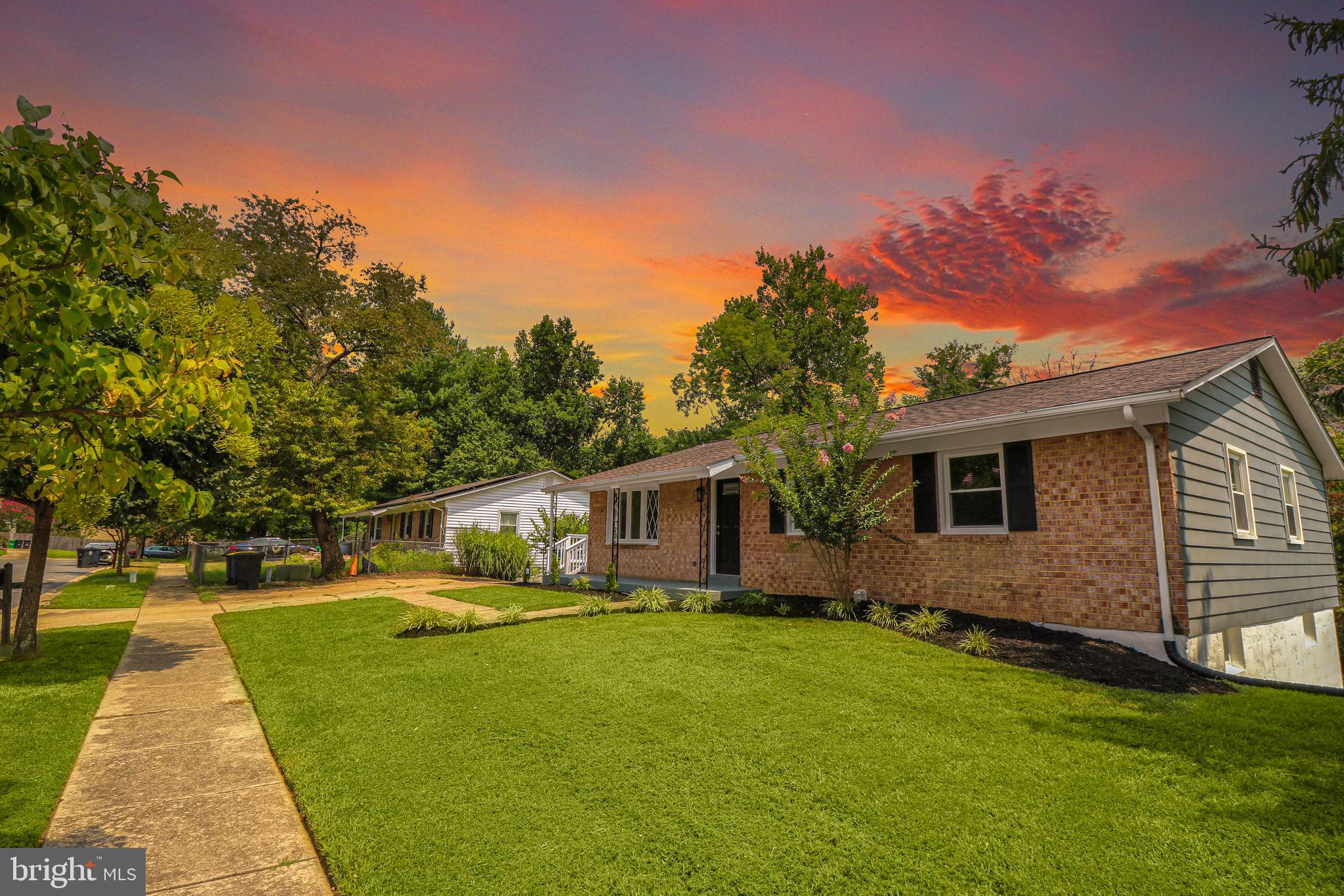 3311 Michele Lane Mitchellville, MD 20721 - Photo 42 of 44 a front view of house with yard and green space
