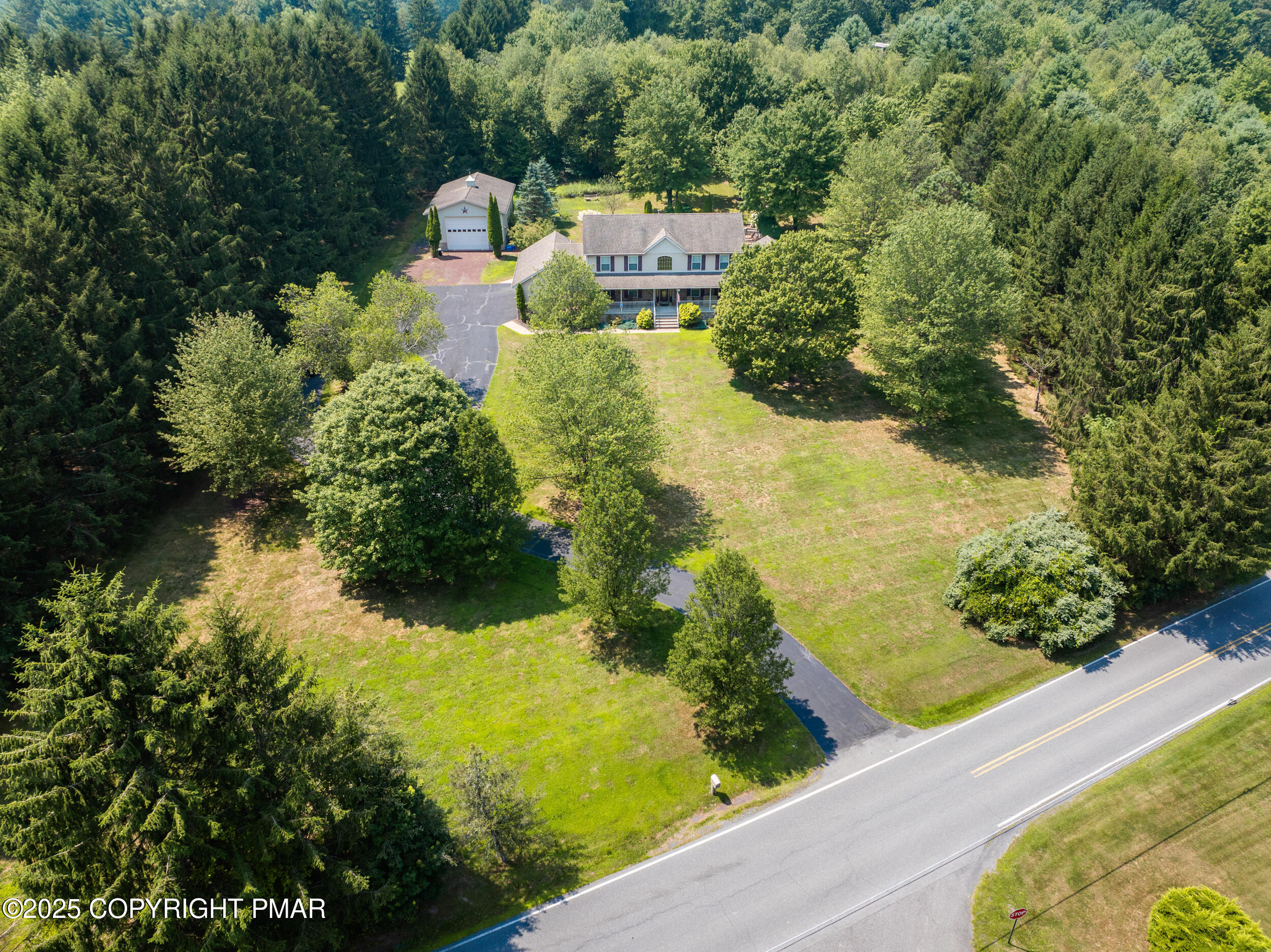 969 Hideaway Hill Road Kunkletown, PA 18058 - Photo 23 of 56 an aerial view of a house with a yard basket ball court and outdoor seating