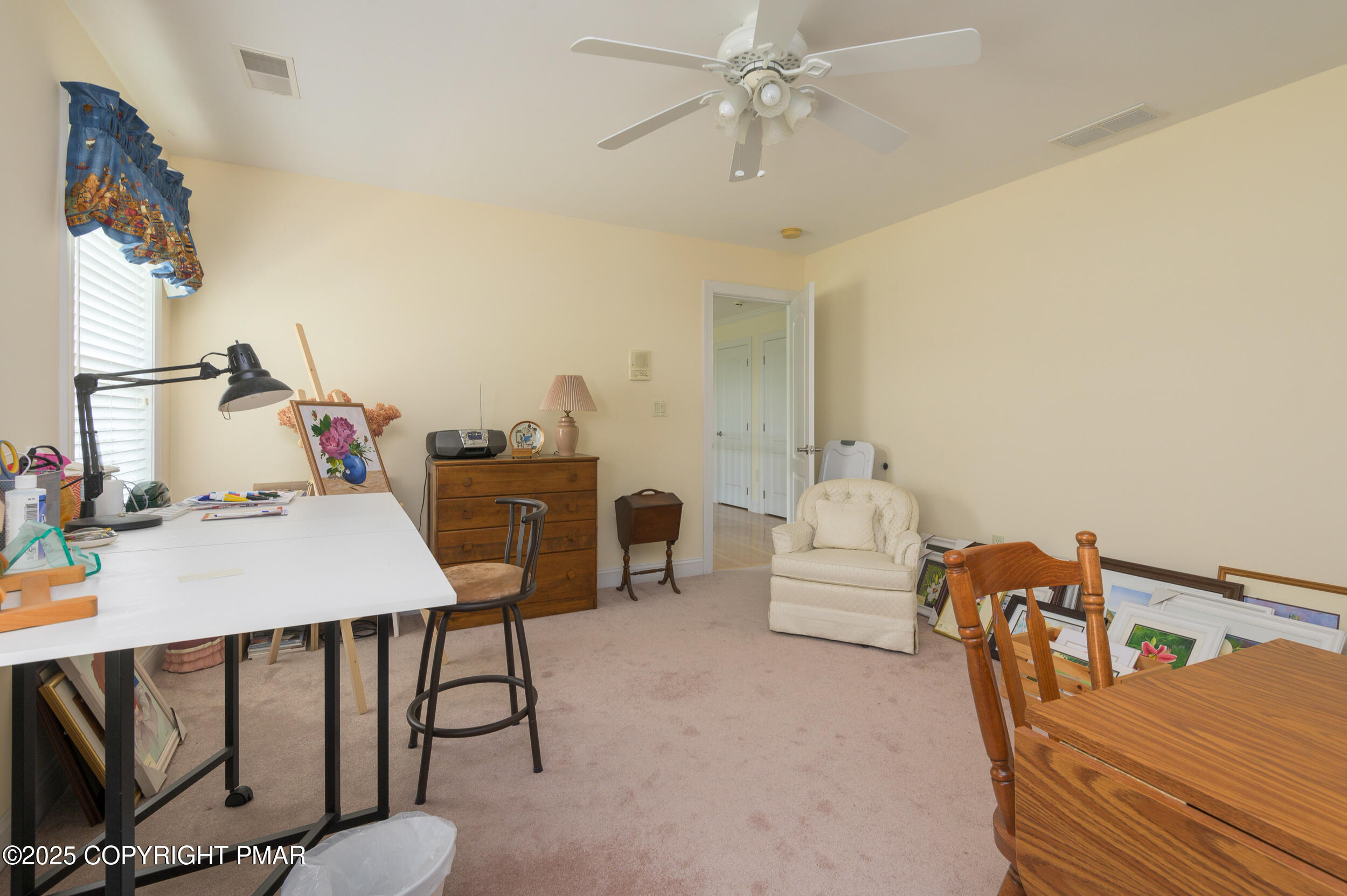 969 Hideaway Hill Road Kunkletown, PA 18058 - Photo 25 of 56 a bedroom with furniture and a chandelier