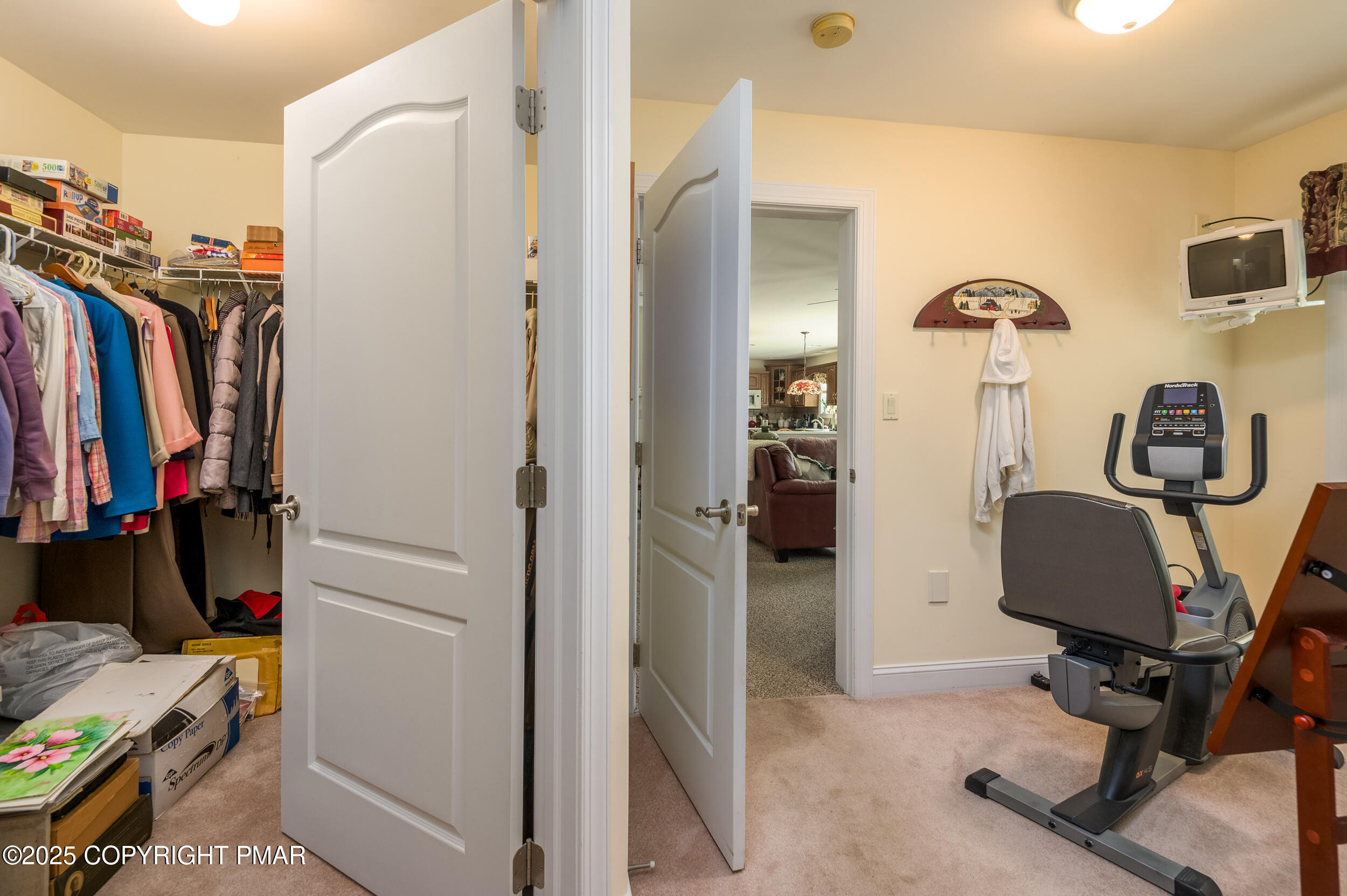 969 Hideaway Hill Road Kunkletown, PA 18058 - Photo 39 of 56 a view of walk in closet with clothes and shoes