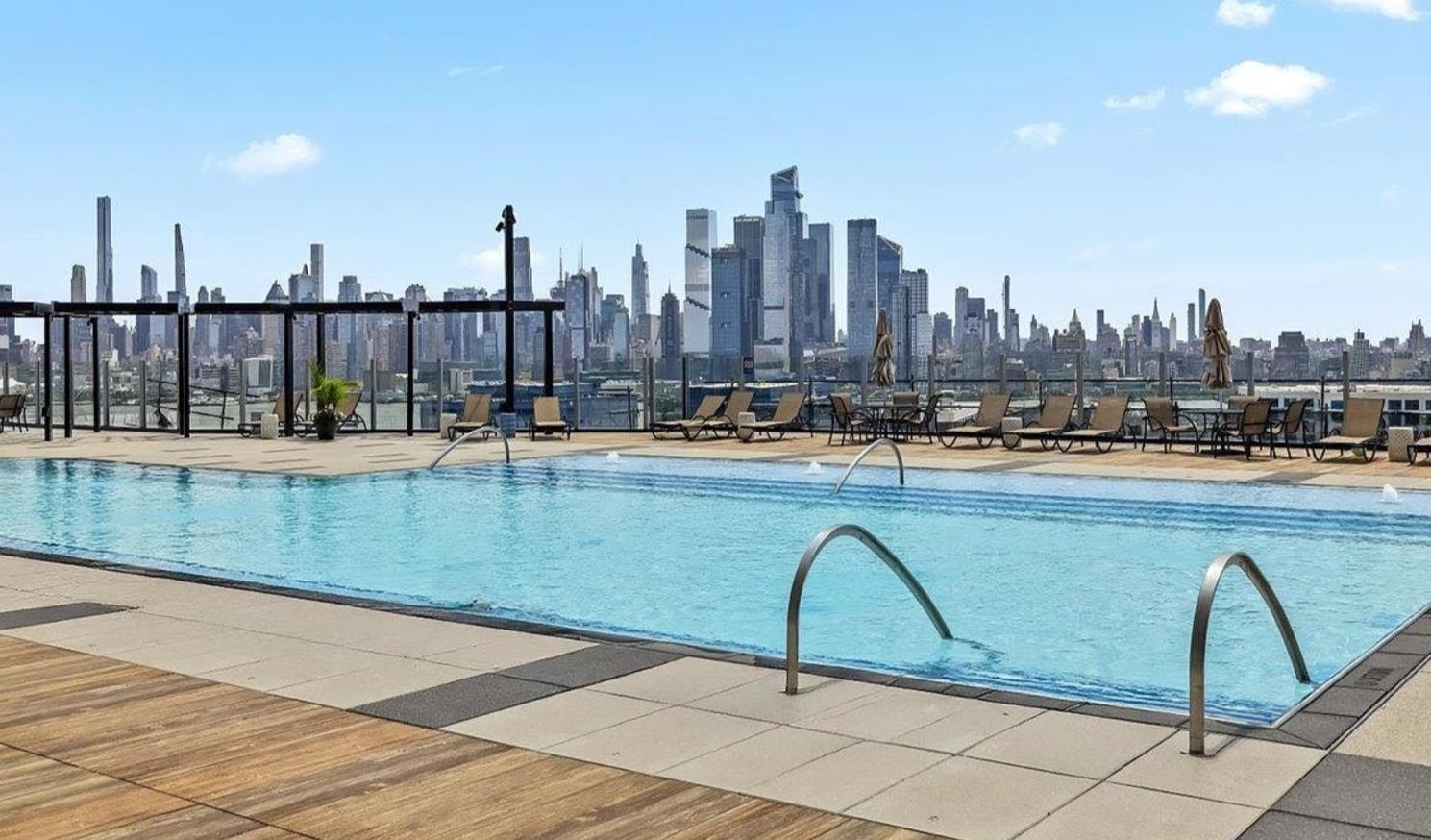 380 Mountain Road, Unit 805 Union City, NJ 07087 - Photo 30 of 31 a terrace with outdoor seating and city view