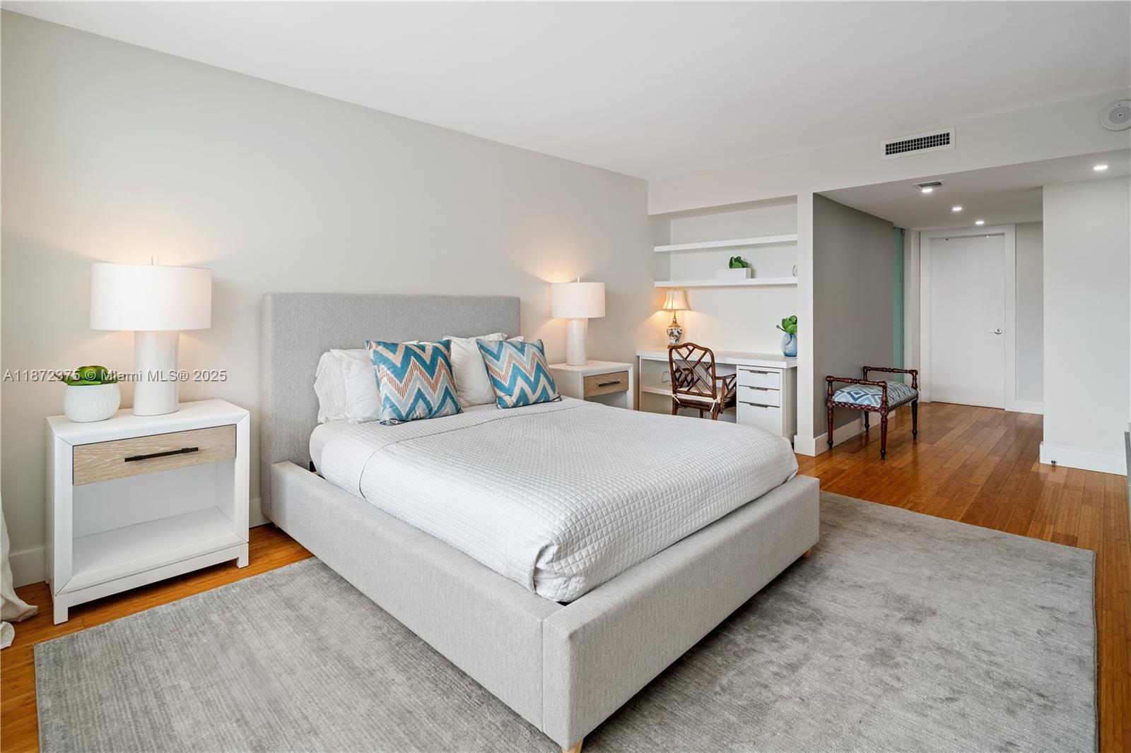 199 Ocean Ln Drive, Unit 1005 Key Biscayne, FL 33149 - Photo 16 of 35 a large white bed in a white room