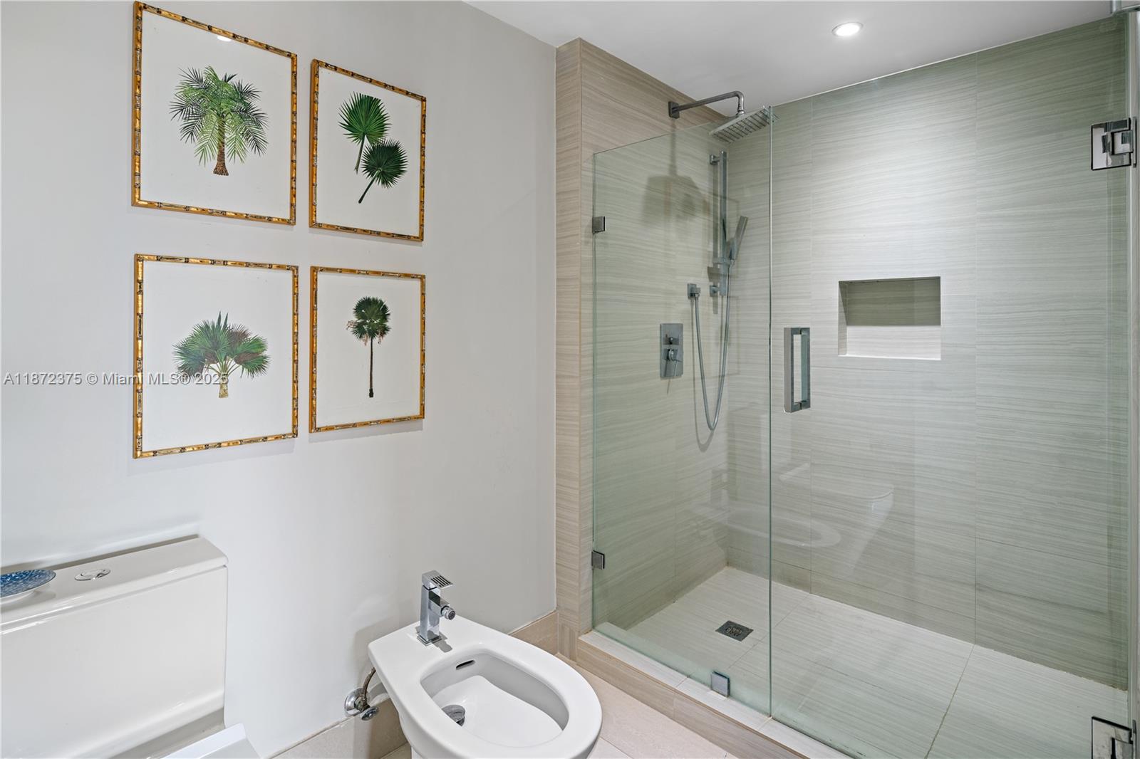 199 Ocean Ln Drive, Unit 1005 Key Biscayne, FL 33149 - Photo 23 of 35 a bathroom with a shower toilet and sink