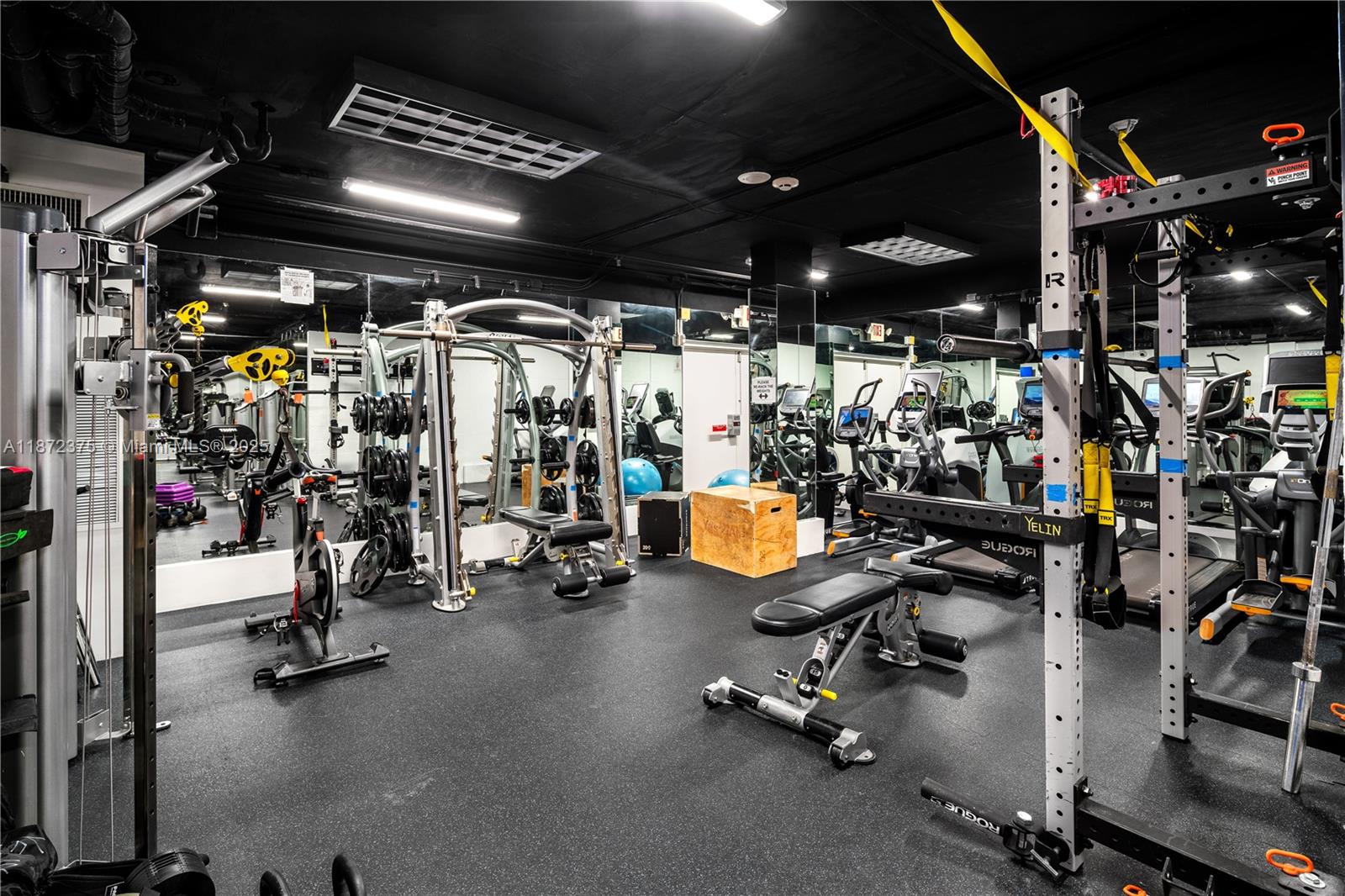 199 Ocean Ln Drive, Unit 1005 Key Biscayne, FL 33149 - Photo 30 of 35 a view of a room with gym equipment