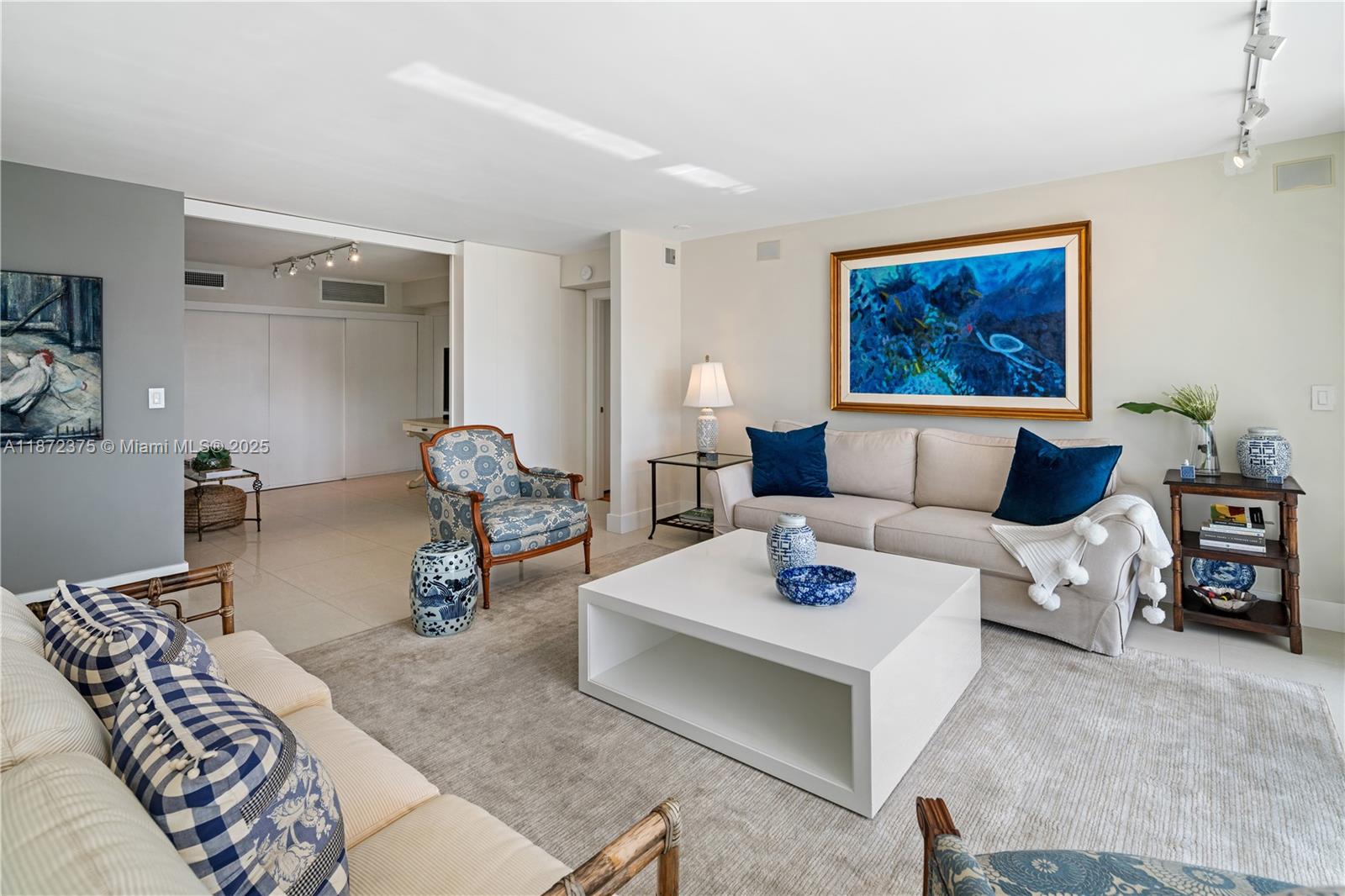 199 Ocean Ln Drive, Unit 1005 Key Biscayne, FL 33149 - Photo 6 of 35 a living room with furniture and a couch