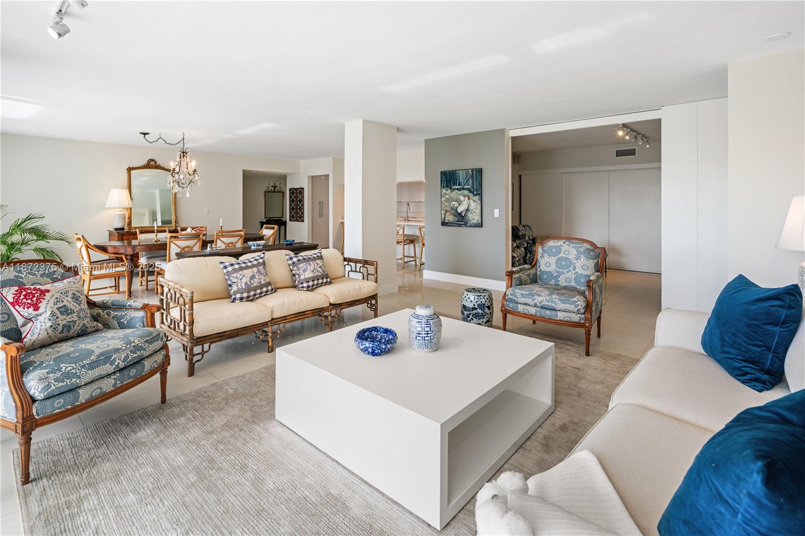 199 Ocean Ln Drive, Unit 1005 Key Biscayne, FL 33149 - Photo 7 of 35 a living room with furniture and a table