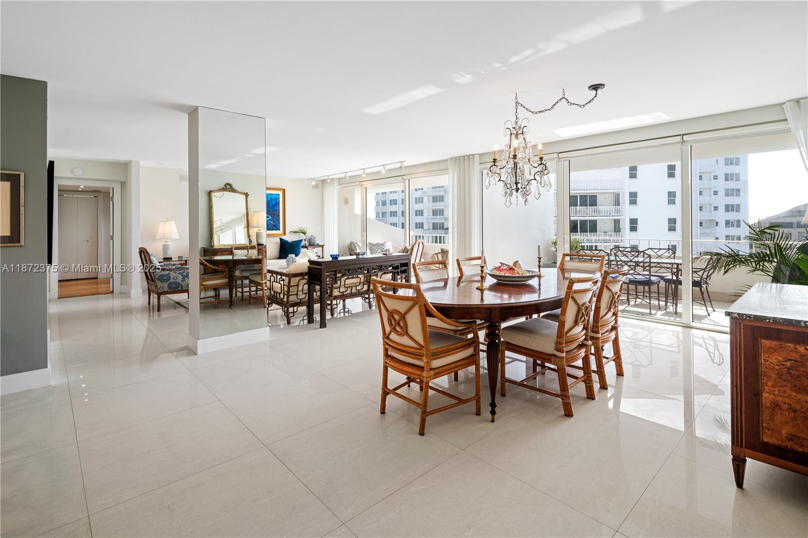 199 Ocean Ln Drive, Unit 1005 Key Biscayne, FL 33149 - Photo 10 of 35 a view of a dining room with furniture window and outside view