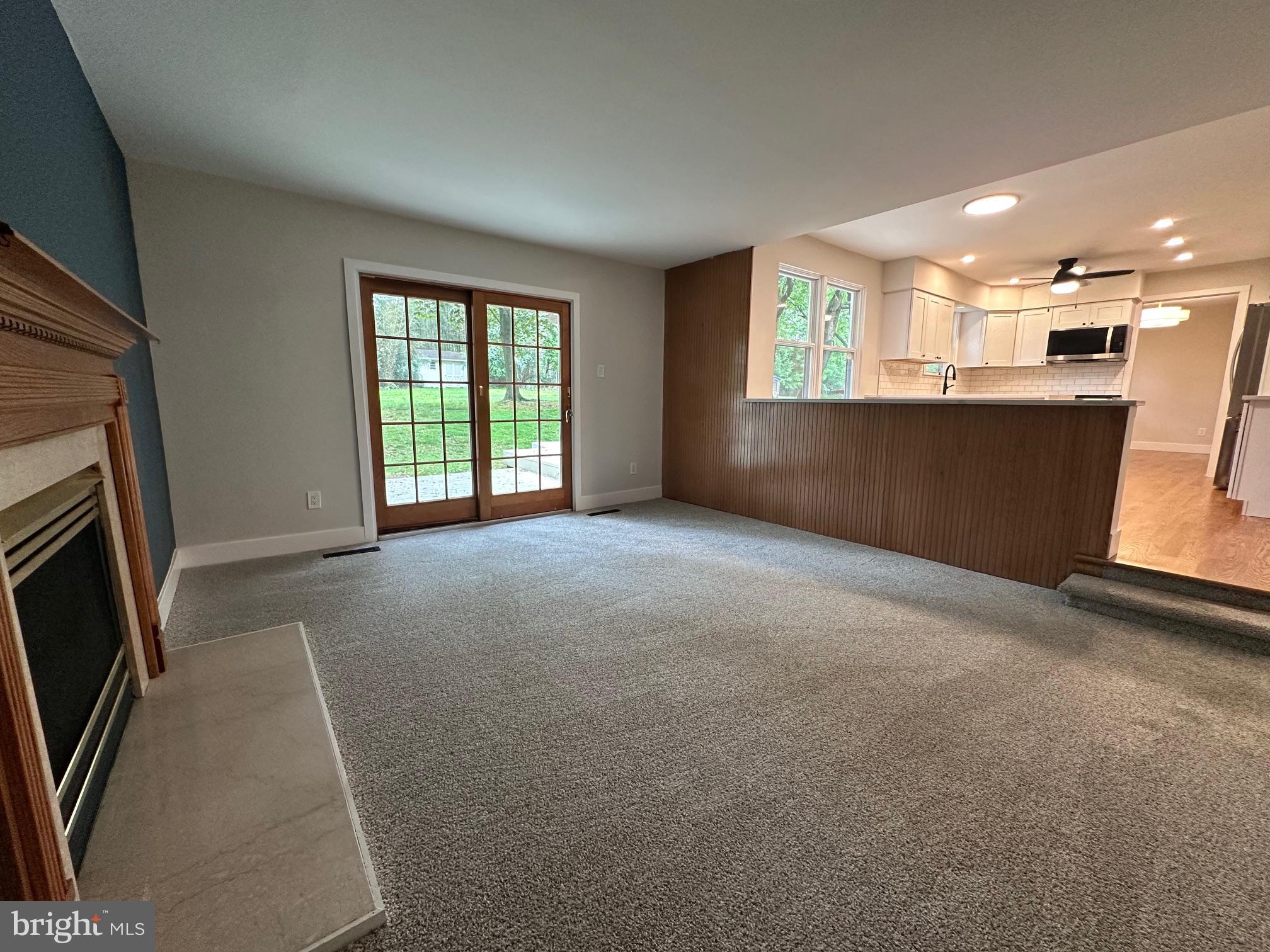 215 Bridge Road Upper Chichester, PA 19061 - Photo 11 of 35 a view of an empty room with a fireplace