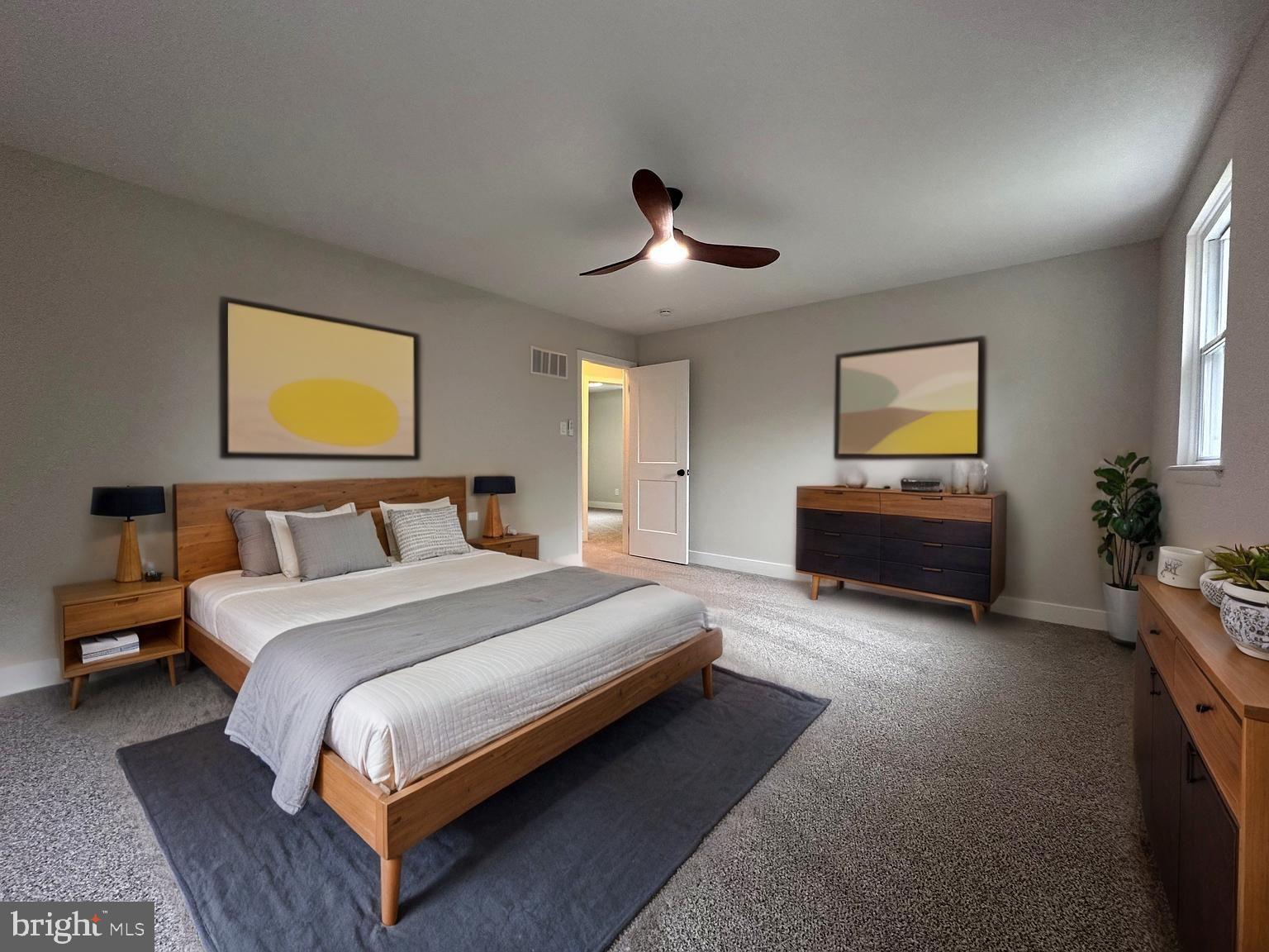 215 Bridge Road Upper Chichester, PA 19061 - Photo 22 of 35 a spacious bedroom with a bed and window