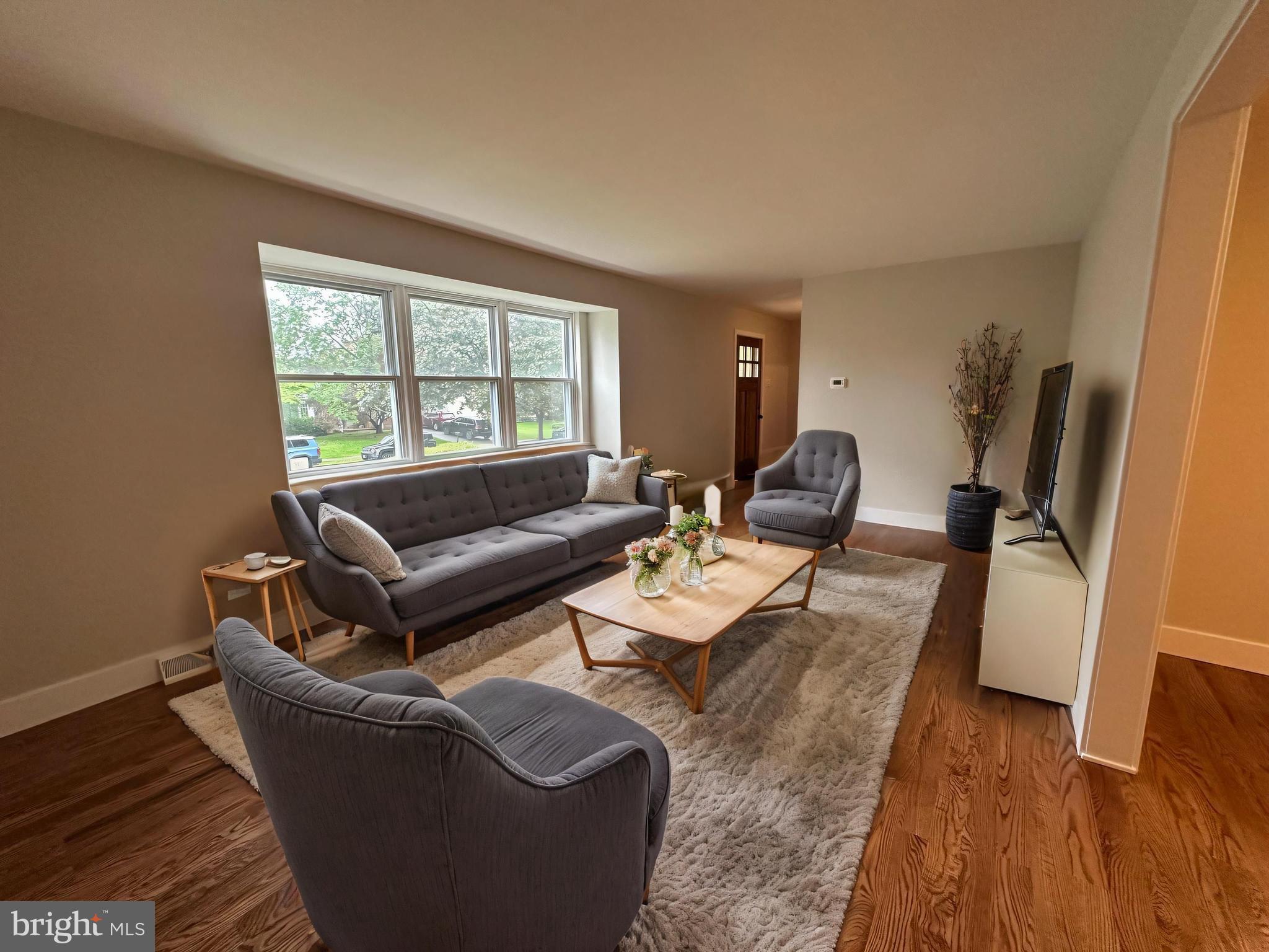 215 Bridge Road Upper Chichester, PA 19061 - Photo 4 of 35 a living room with furniture and a window