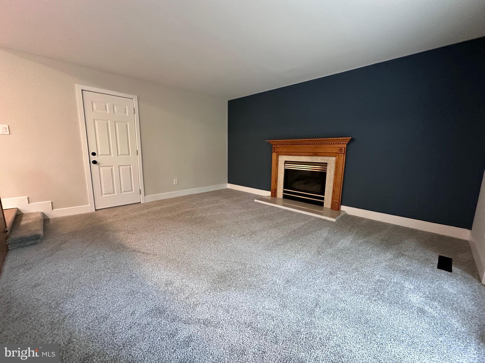 215 Bridge Road Upper Chichester, PA 19061 - Photo 9 of 35 a view of empty room with a fireplace