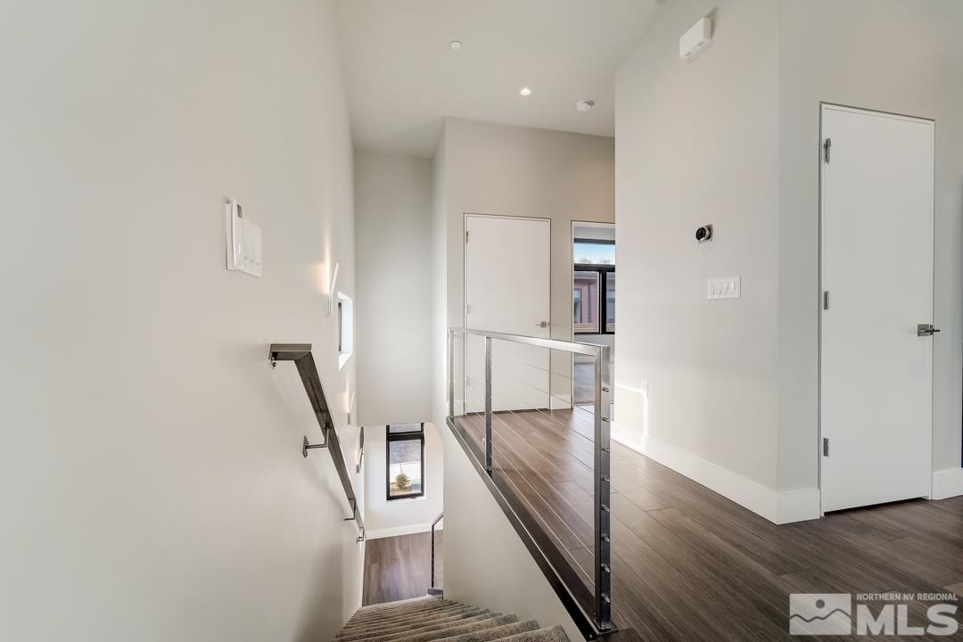 100 High Street, Unit 100 Reno, NV 89502 - Photo 13 of 20 wooden floor in an empty room with an entryway