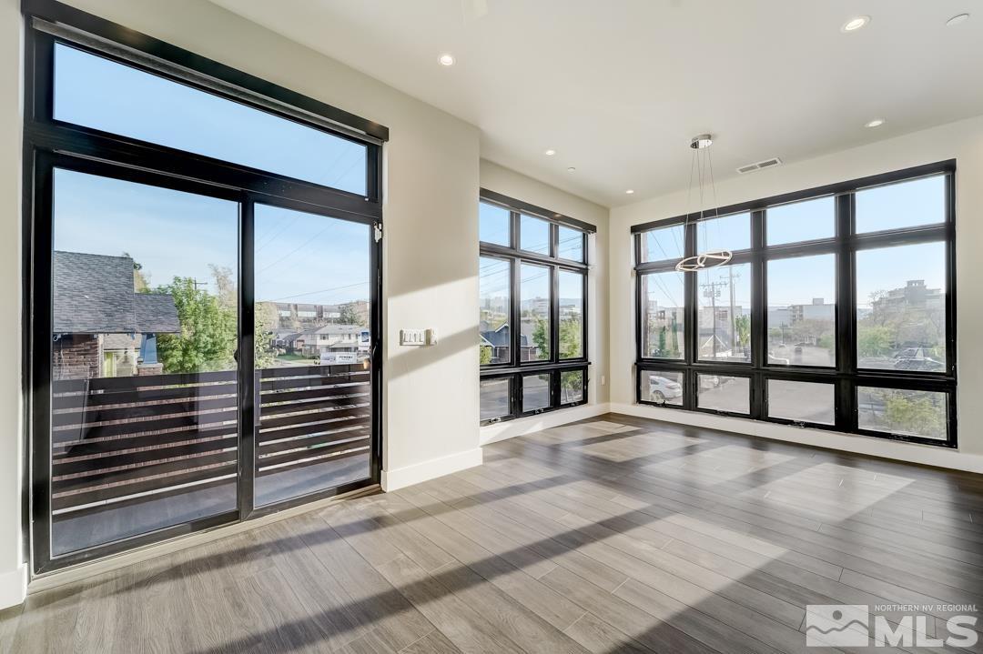 100 High Street, Unit 100 Reno, NV 89502 - Photo 3 of 20 a view of an empty room with windows