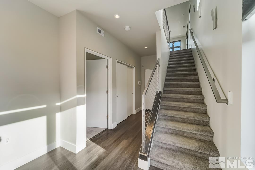 100 High Street, Unit 100 Reno, NV 89502 - Photo 7 of 20 a view of entryway and hall with wooden floor