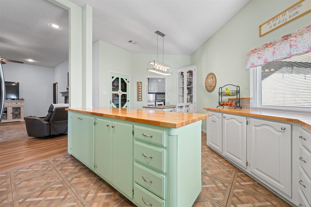 905 Evandale Road Burleson, TX 76028 - Photo 17 of 40 a spacious bathroom with a double vanity sink and a mirror