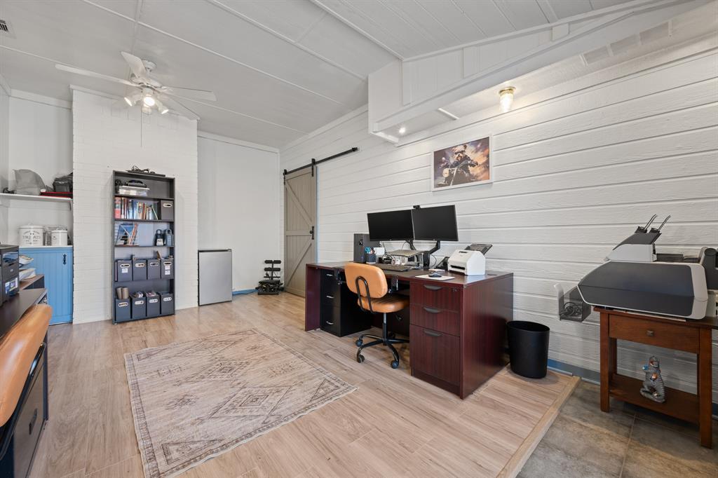 905 Evandale Road Burleson, TX 76028 - Photo 35 of 40 a view of a workspace with furniture