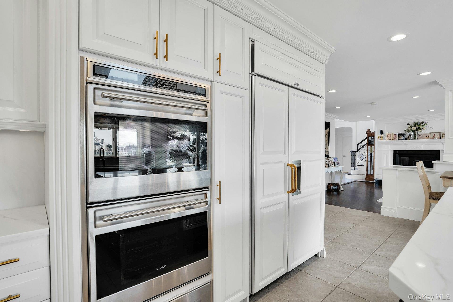 10 Beech Road Islip, NY 11751 - Photo 20 of 49 Wolf double ovens and Sub-zero, paneled refrigerator and freezer.