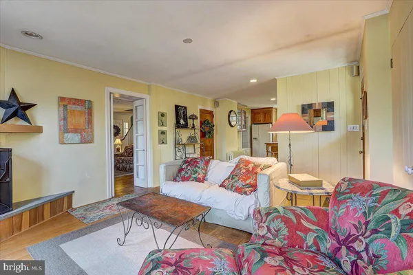 a living room with furniture and a table