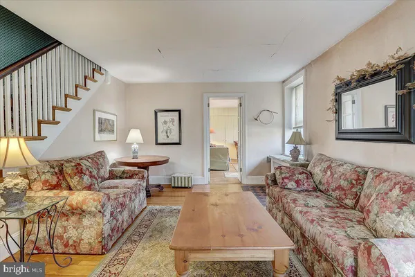 a living room with furniture and a couch