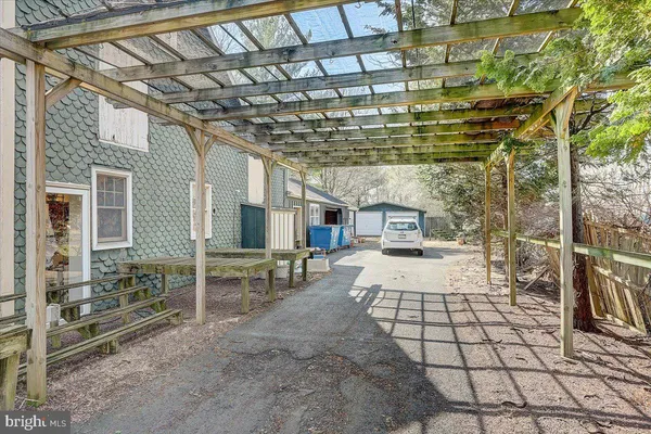 a view of a garden with a pathway