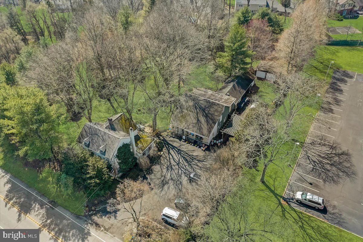 1525 Limekiln Pike Dresher, PA 19025 - Photo 49 of 52 an aerial view of a house with a yard