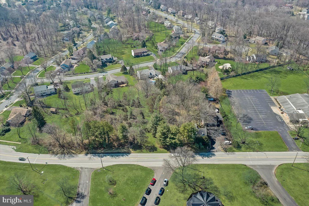 1525 Limekiln Pike Dresher, PA 19025 - Photo 50 of 52 an aerial view of a yard with a barn