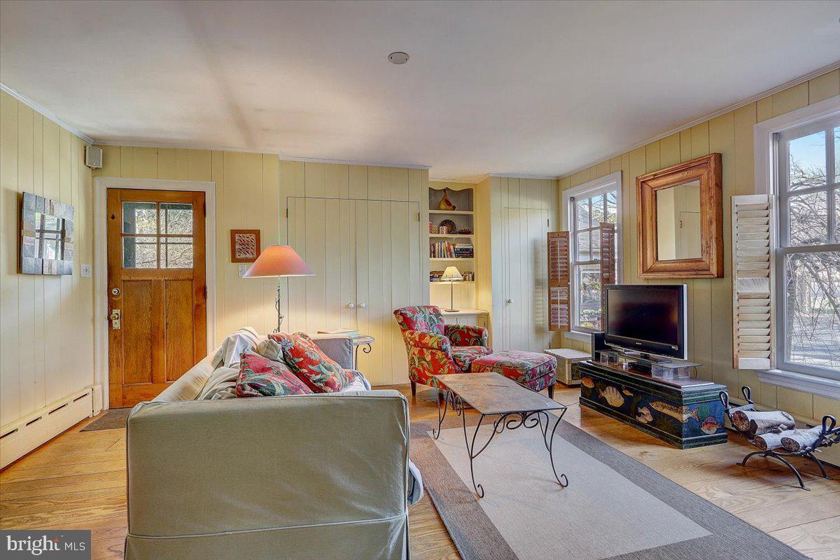1525 Limekiln Pike Dresher, PA 19025 - Photo 8 of 52 a living room with furniture and a flat screen tv