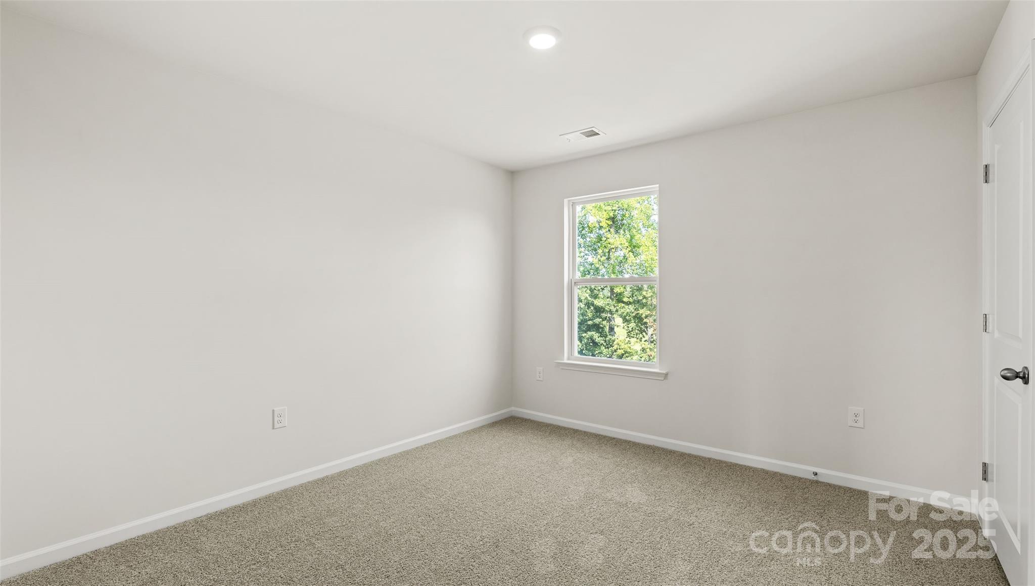 155 Callie River Clyde, NC 28721 - Photo 17 of 29 an empty room with a window